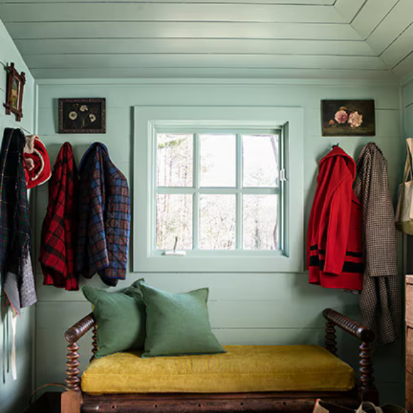 A retro mudroom with walls and ceiling painted in Benjamin Moore Classics Collection paint
