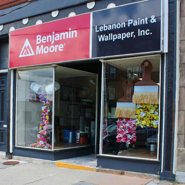 The storefront of Lebanon Paint & Wallpaper with outdoor signage indicating an authorized Benjamin Moore paint retailer
